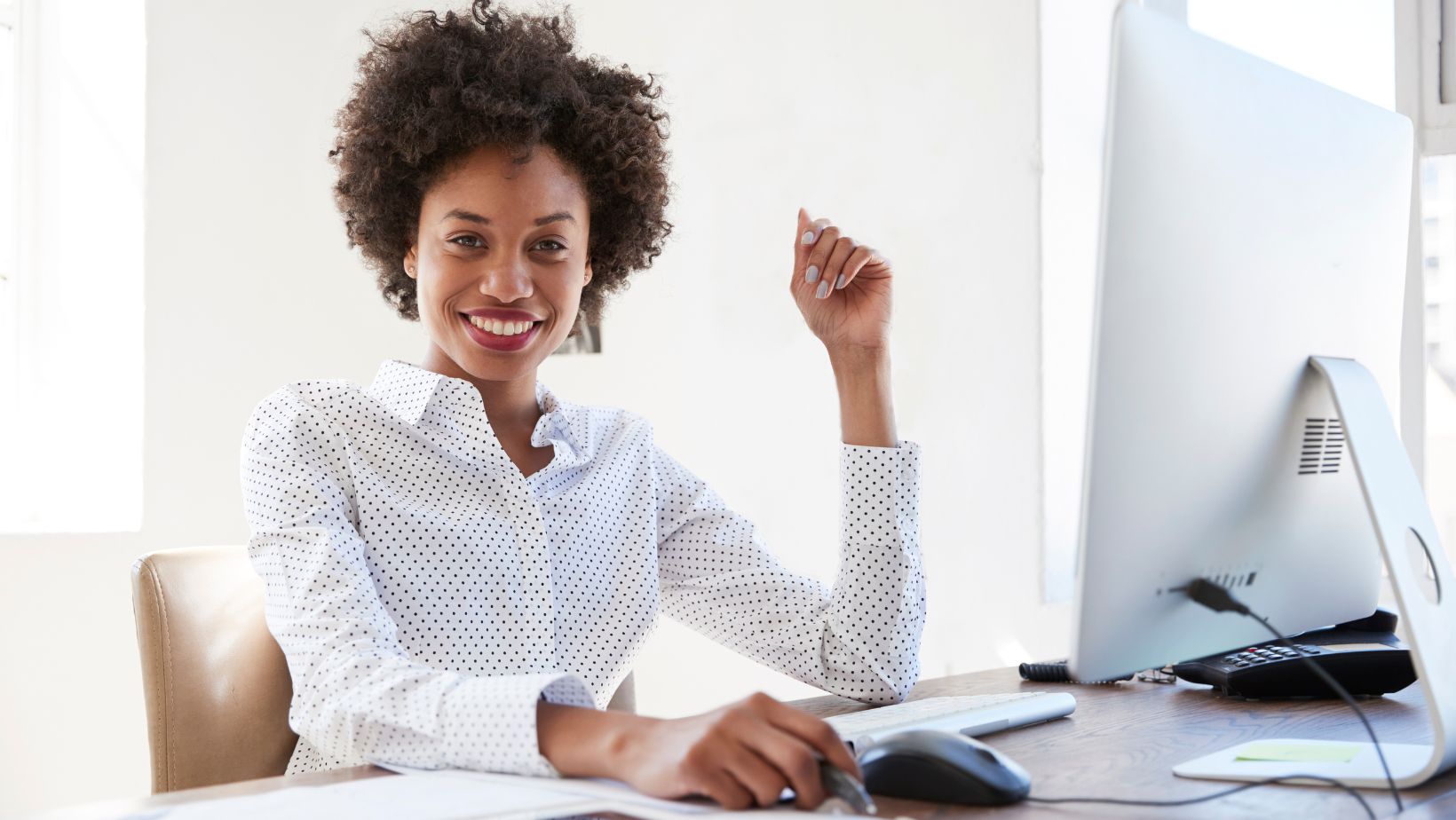 Internet access options | A woman at her computer