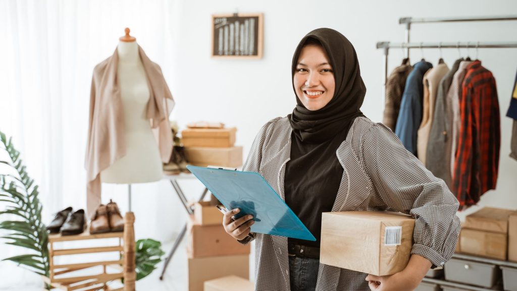 Business owner posing with her retail items