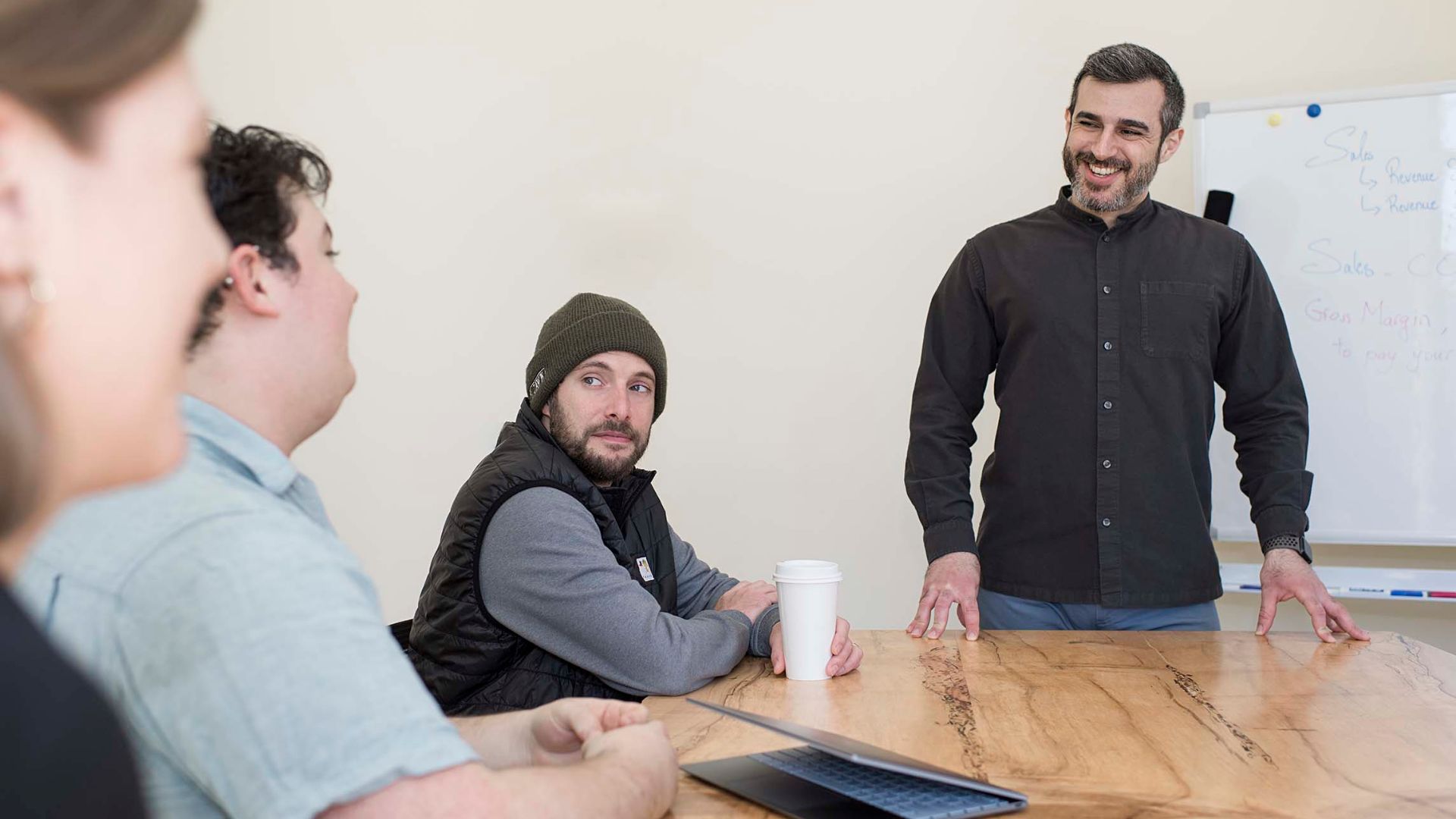 A small team meets to discuss big ideas!