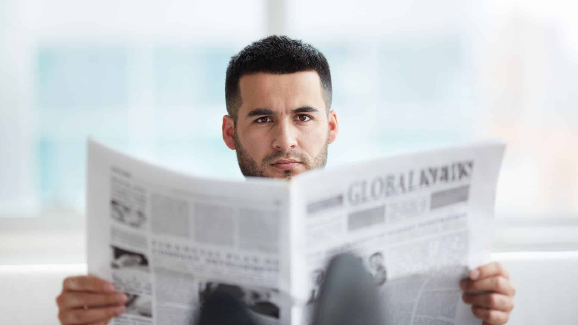 Inc413 Man Reading News Paper