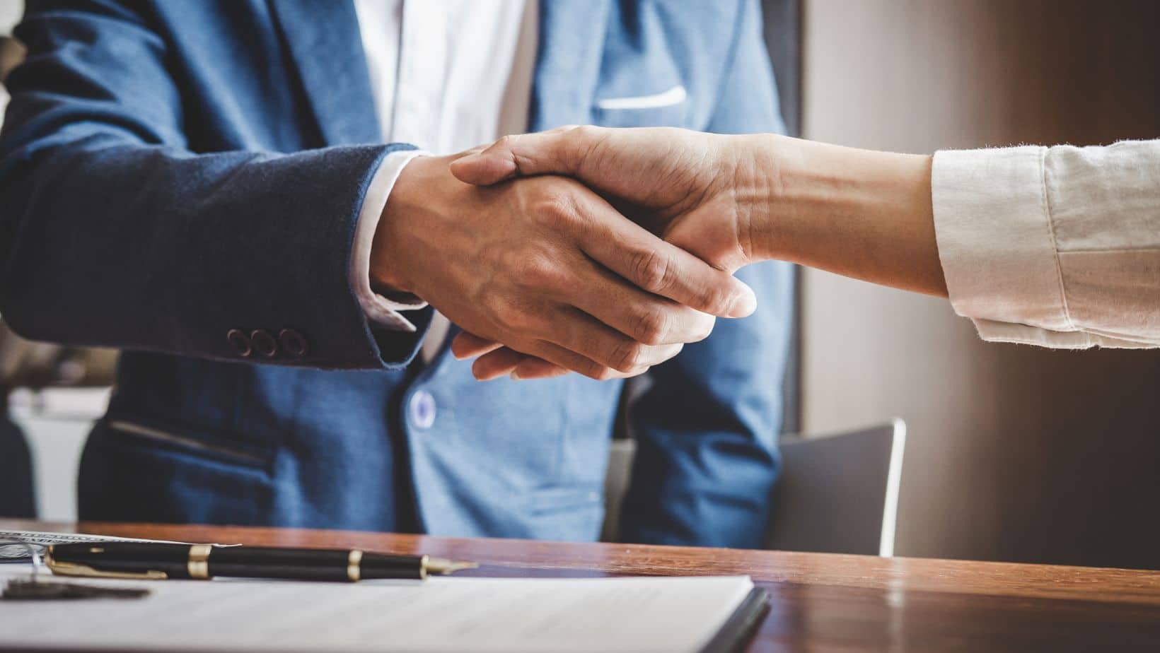 Two people shaking hands