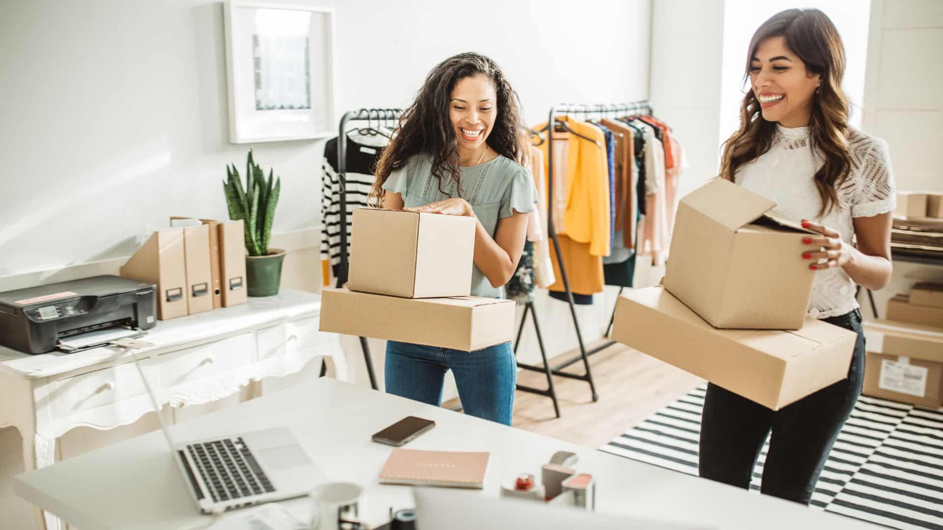 Business owners planning and curating their packaging for their business.