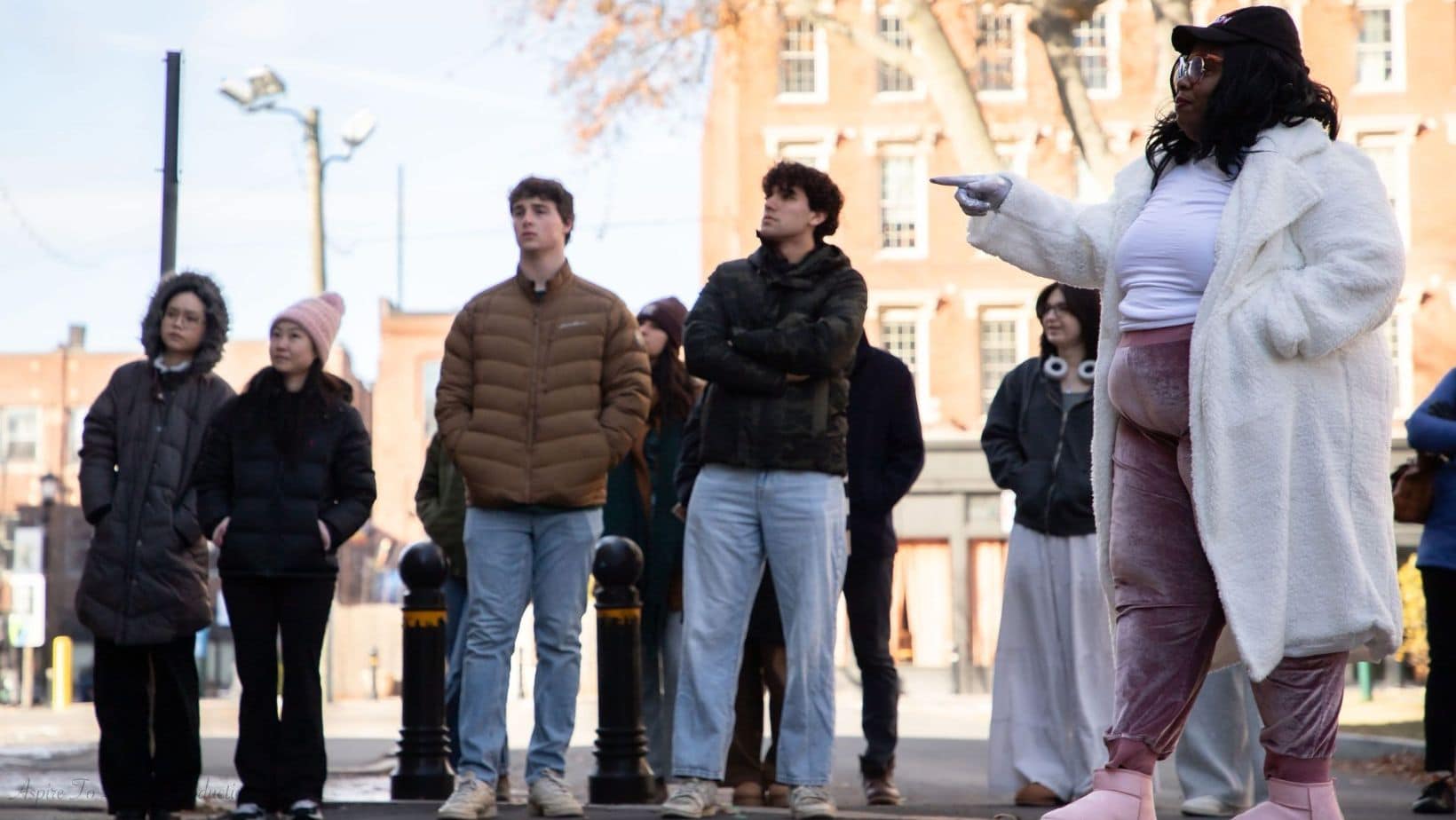 Tiffany Allecia leads students from Amherst College on a tour of Downtown Springfield, January 2024